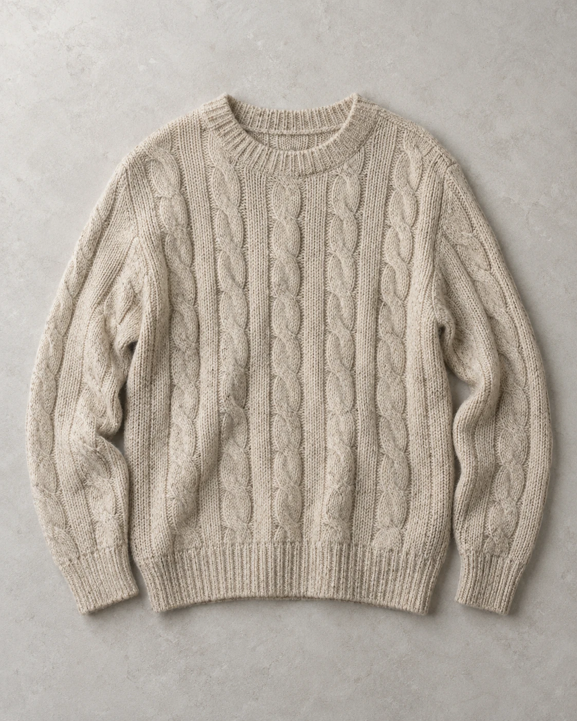 Pre-loved oatmeal cable-knit sweater concept